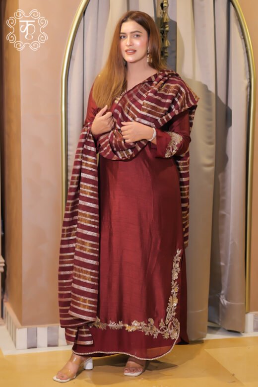 Model wearing a maroon striped draped suit set – Suits Collection