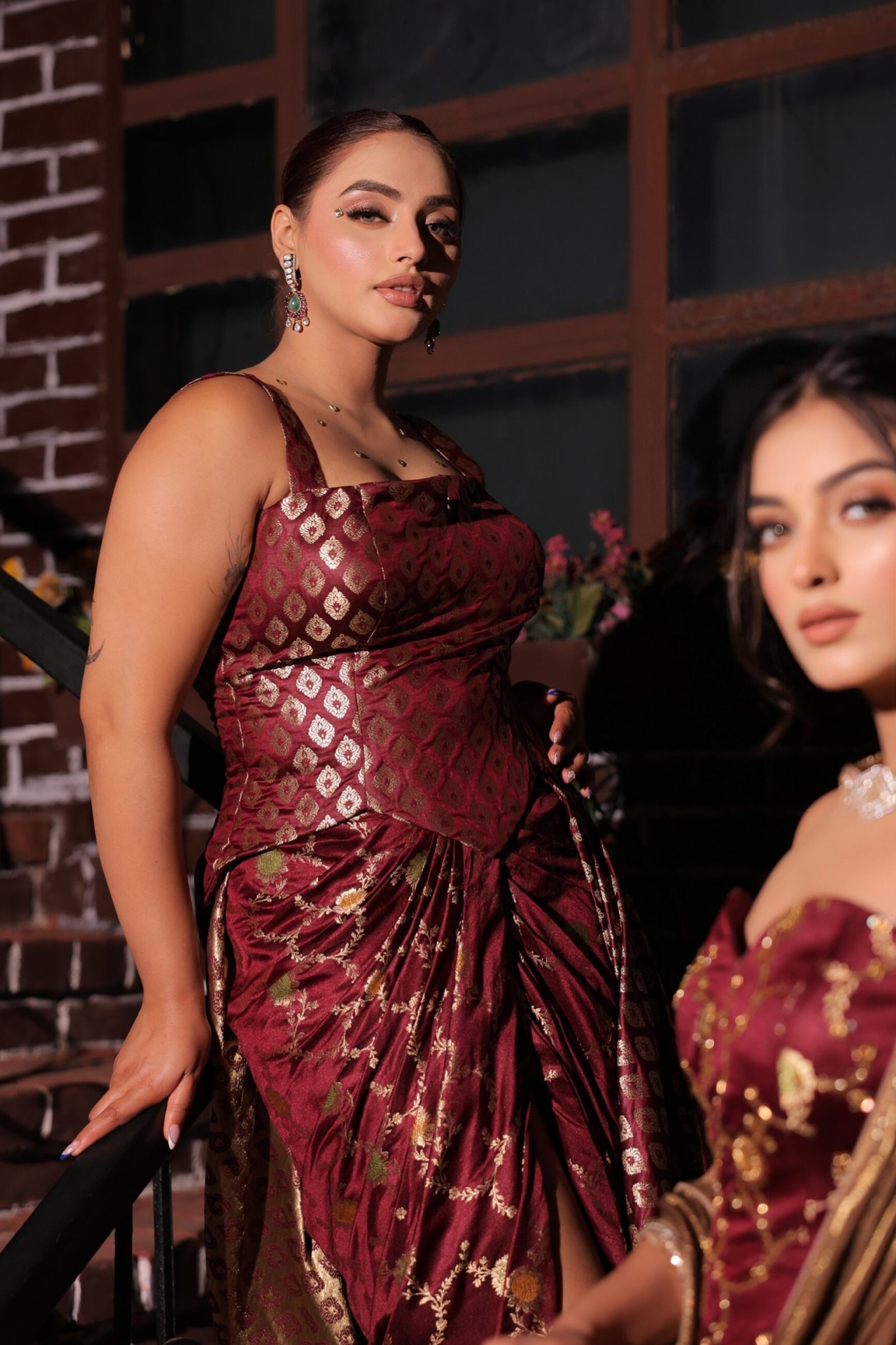 women in maroon brocade saree draped as a modern gown, Kridhaa festive collection