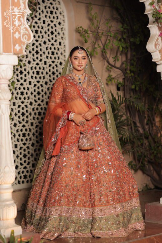 Elegant bridal lehenga in rust orange for weddings and festive occasions