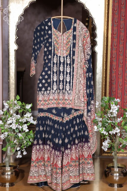 Elegant navy blue sharara suit featuring intricate floral embroidery