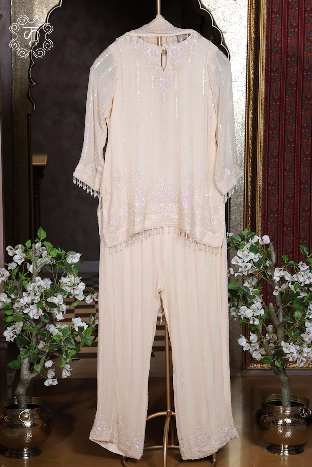 Elegant ivory party wear suit with matching dupatta