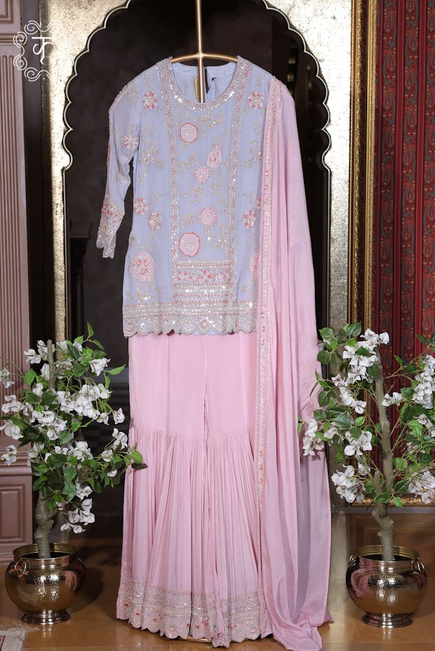 Elegant lavender ethnic suit featuring intricate floral embroidery
