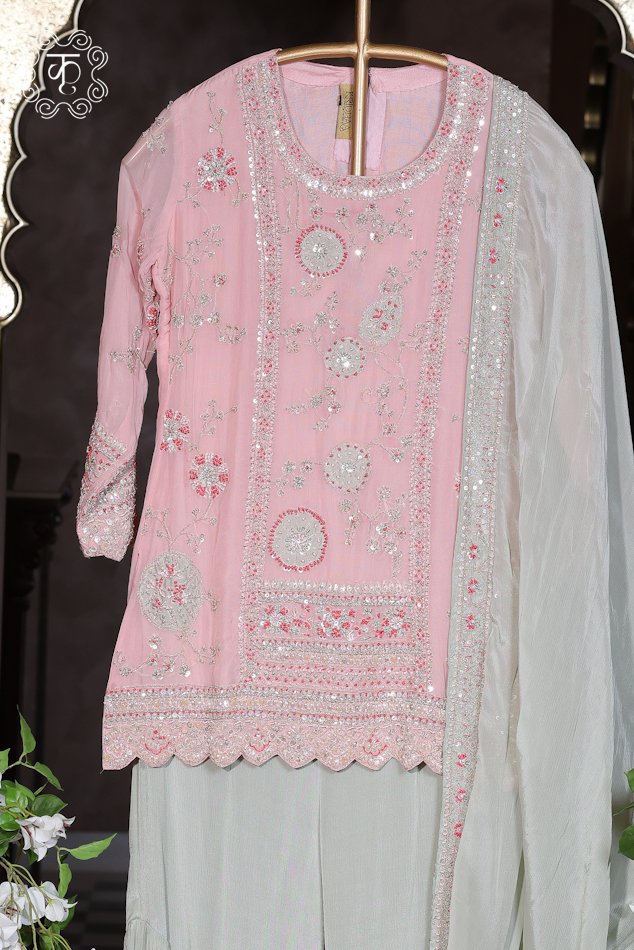 Elegant blush pink ethnic sharara suit featuring intricate floral embroidery