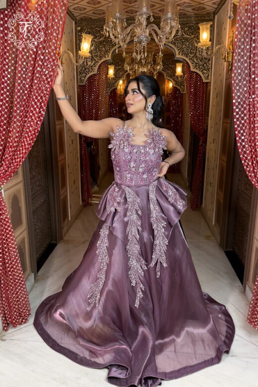 Elegant mauve reception gown with hand embroidery