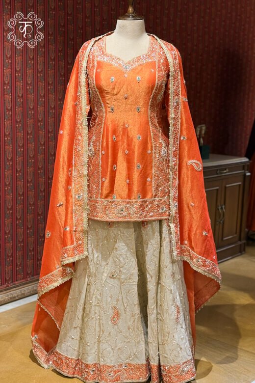 Elegant coral orange wedding sharara suit for women