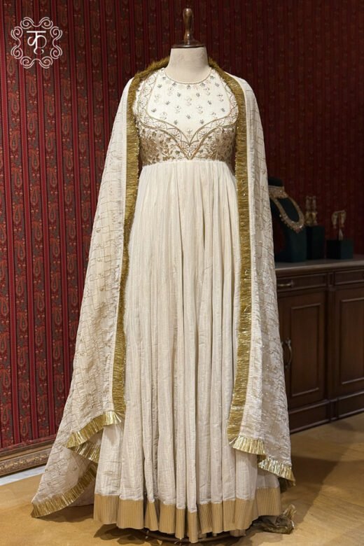 Elegant ivory designer Anarkali suit with gold zari embroidery