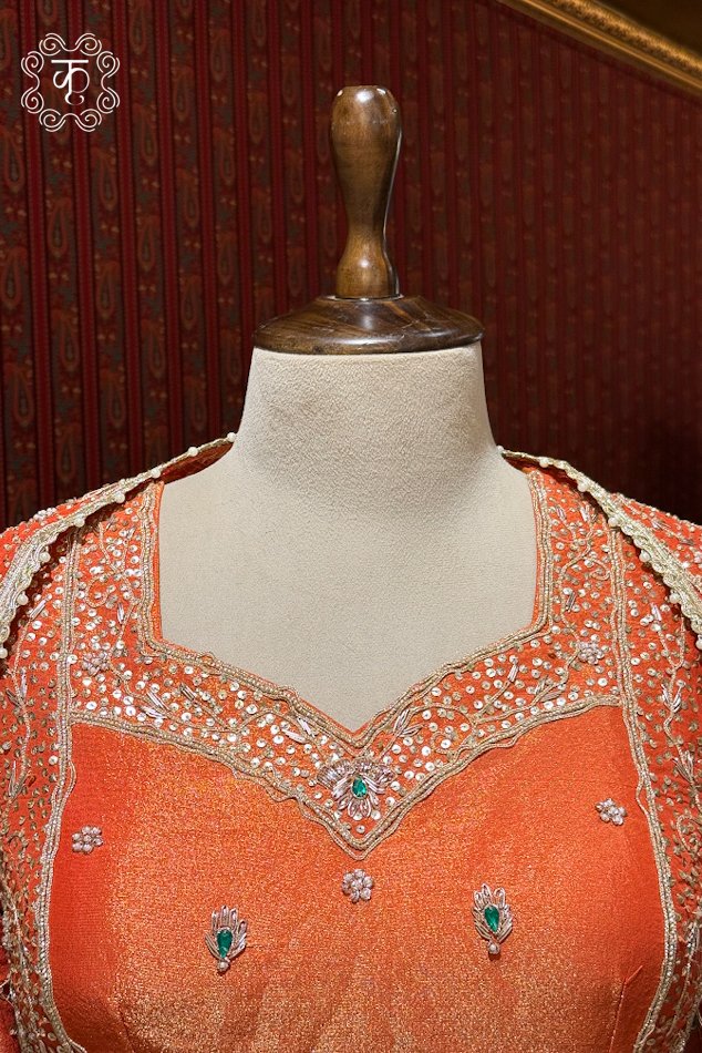 Traditional coral orange embroidered sharara suit for weddings