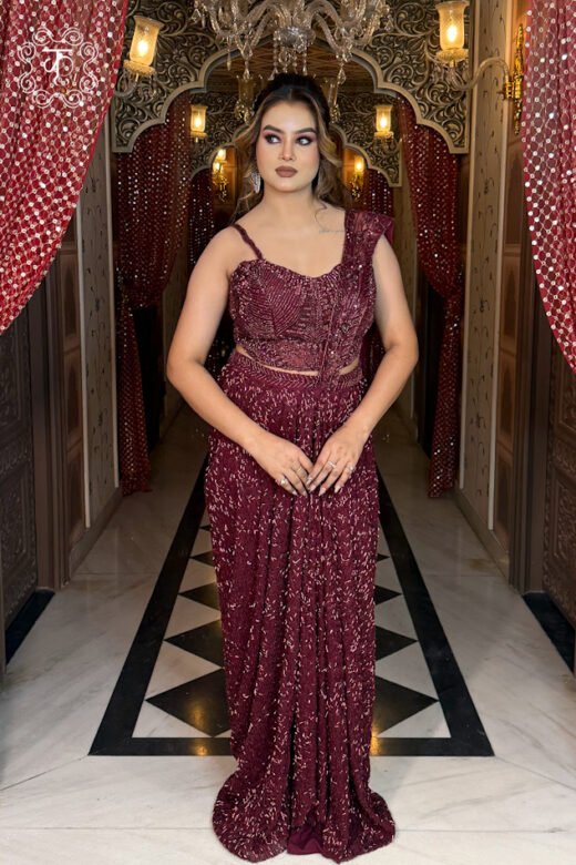 Wine sequin embellished designer draped saree with embroidered blouse