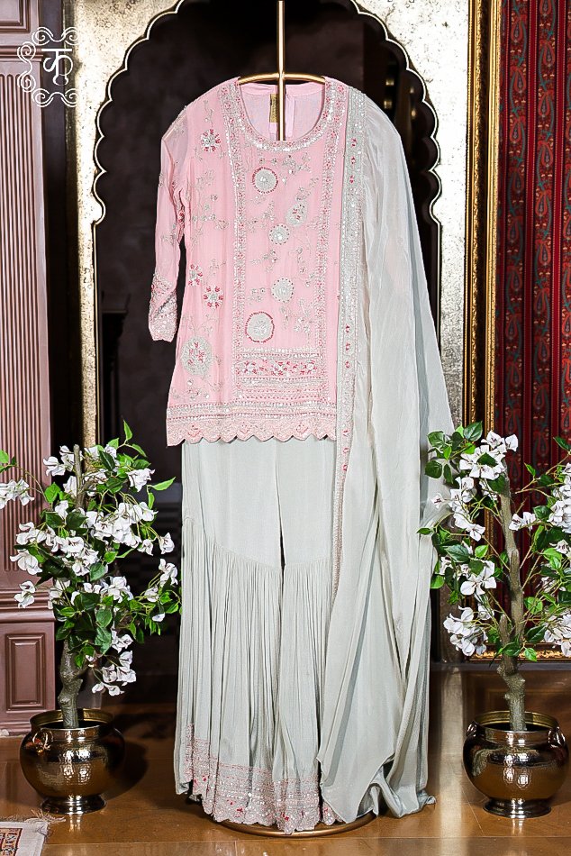 Elegant blush pink ethnic sharara suit featuring intricate floral embroidery