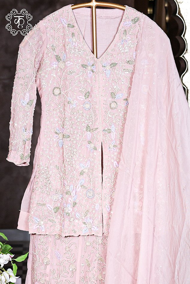 Luxury blush pink ethnic sharara suit featuring intricate floral embroidery