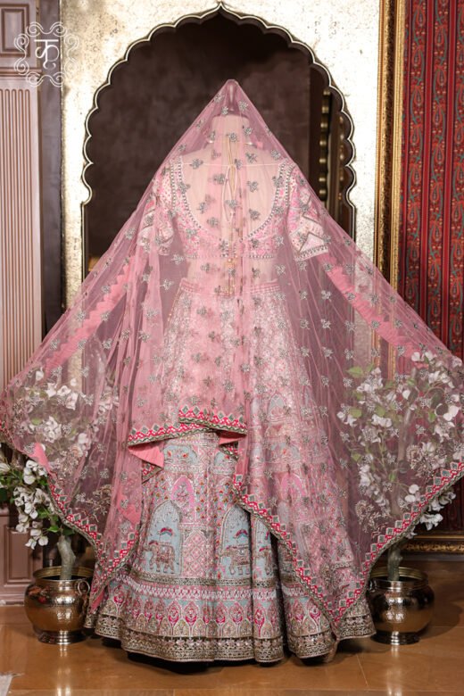 Back view of the Hand Embroidered Heavy Bridal Lehenga Choli Set showcasing the detailed blouse back and flared skirt silhouette from Kridhaa.