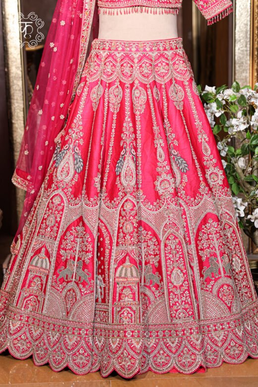 Detailed view of the embellished sheer net dupatta with finished embroidered borders from the Hand Embroidered Heavy Bridal Lehenga Choli Set.