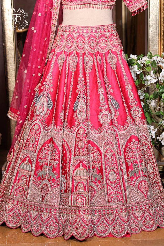 Detailed view of the embellished sheer net dupatta with finished embroidered borders from the Hand Embroidered Heavy Bridal Lehenga Choli Set.
