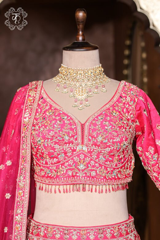 Close-up of the detailed palace archway motifs and scalloped hemline on the Hand Embroidered Heavy Bridal Lehenga Choli Set skirt.
