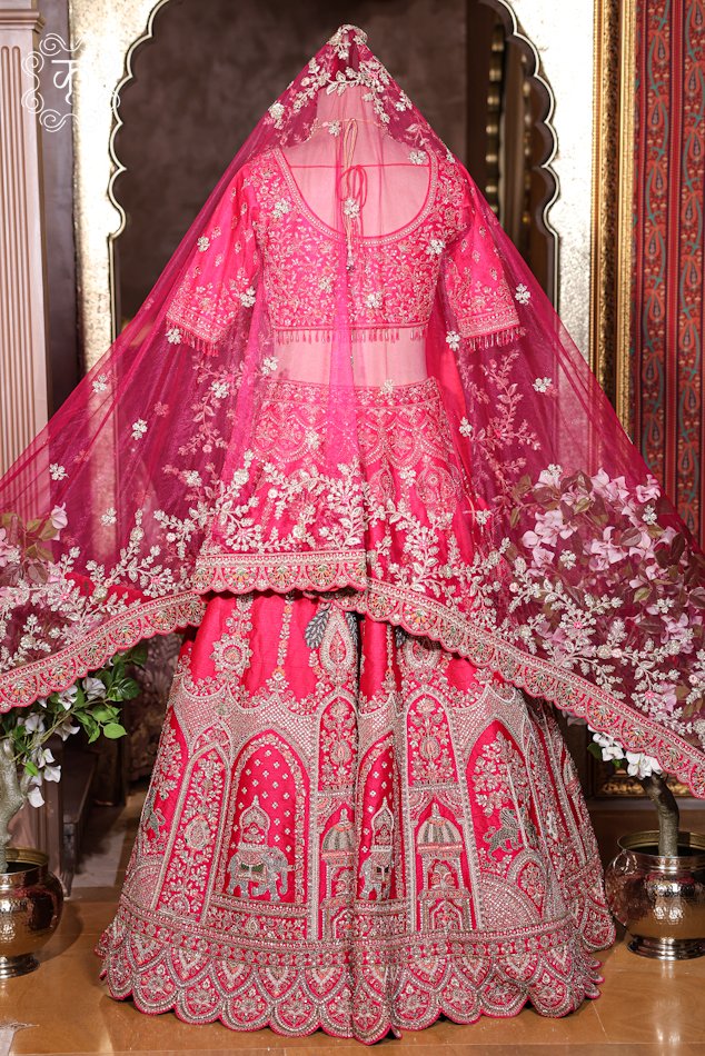 Complete silhouette of the Hand Embroidered Heavy Bridal Lehenga Choli Set displaying the full flared skirt and draped dupatta from Kridhaa.