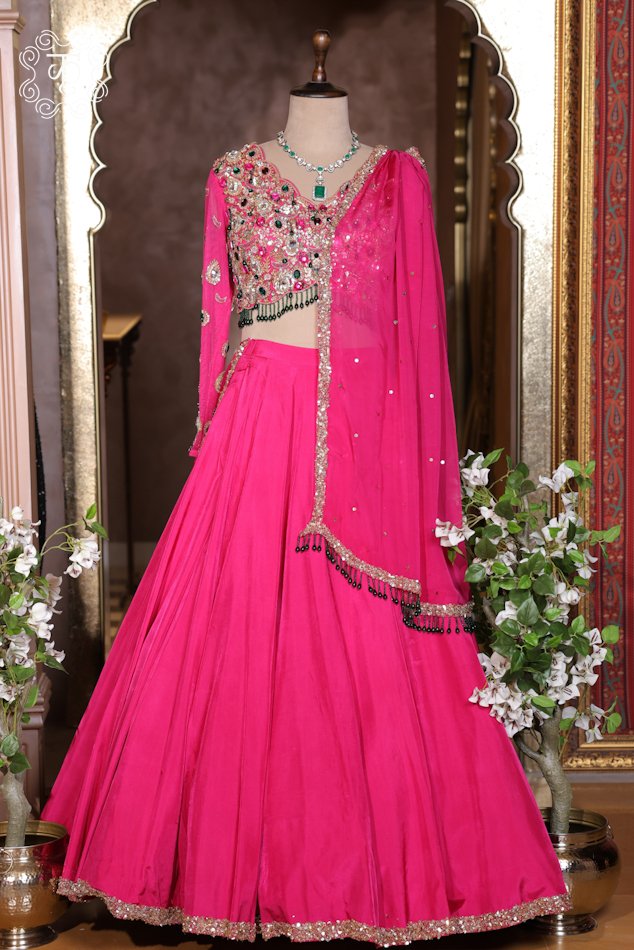 Complete flared silhouette of the Hand Embroidered Stone Work Designer Lehenga Choli Set with a draped net dupatta from Kridhaa.