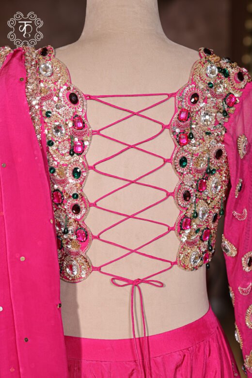 Close-up of the sheer net dupatta featuring sequin highlights and a beaded scalloped border trim from the Hand Embroidered Stone Work Designer Lehenga Choli Set.