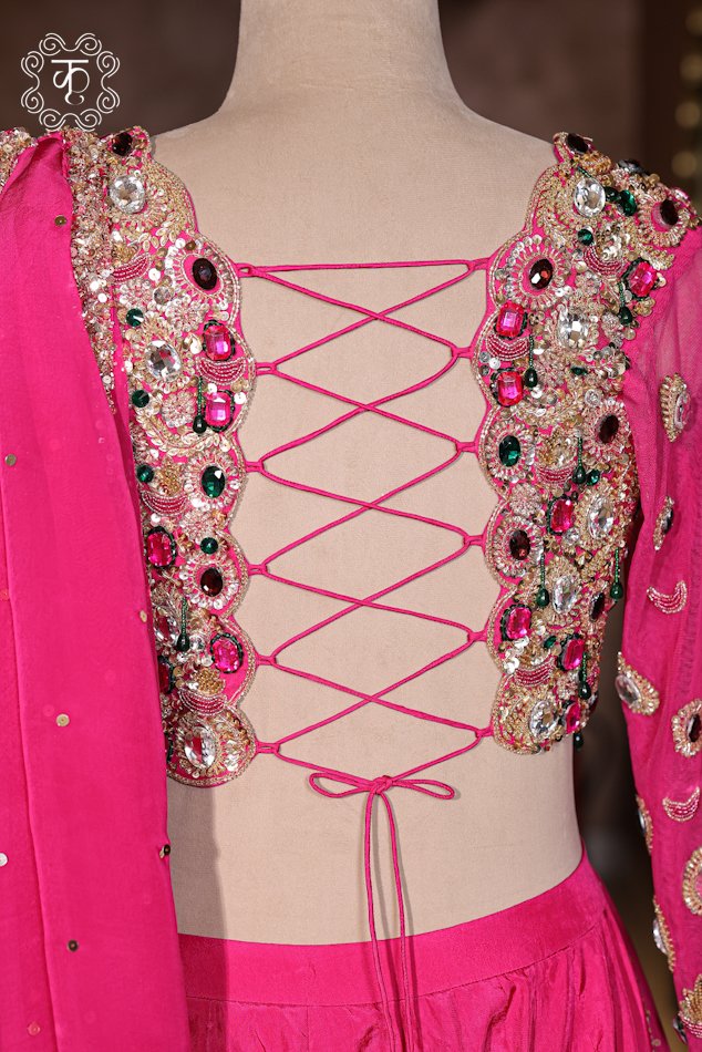 Close-up of the sheer net dupatta featuring sequin highlights and a beaded scalloped border trim from the Hand Embroidered Stone Work Designer Lehenga Choli Set.