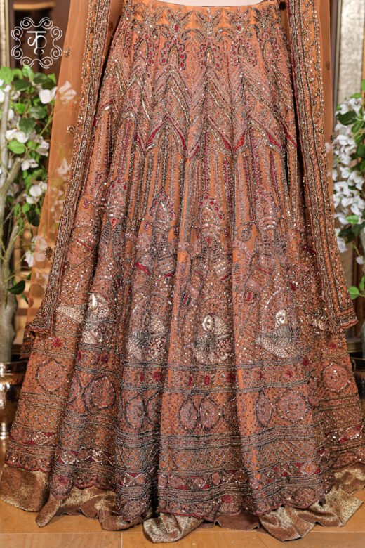 Close-up of the sweetheart neckline hand-embroidered blouse from the Hand Embroidered Heavy Bridal Lehenga Choli Set.