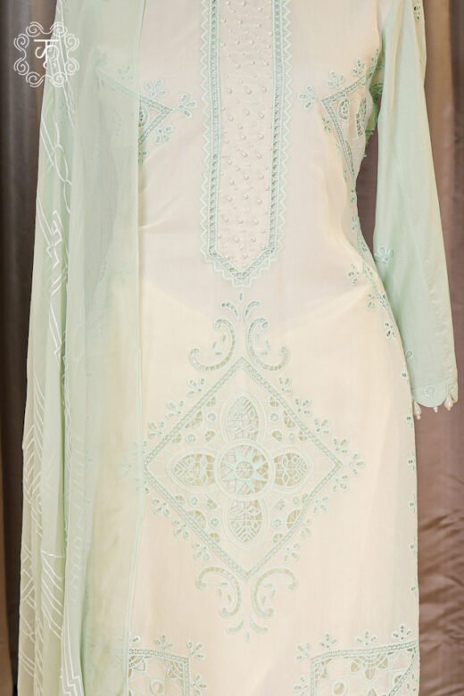Close-up of the pearl embellishments and thread embroidery on the placket of the Embroidered Cutwork and Pearl Work Suit Set.