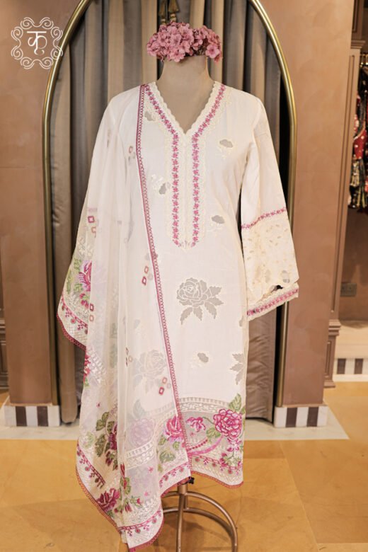 Complete silhouette of the Hand Embroidered Floral V-Neck Chikankari and Schiffli Cutwork Suit Set displaying the straight tunic and printed dupatta from Kridhaa.