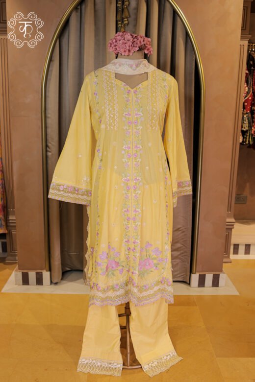 Complete silhouette of the Floral Thread Embroidered Chikankari and Lace Border Suit Set displaying the straight tunic and flared trousers from Kridhaa.
