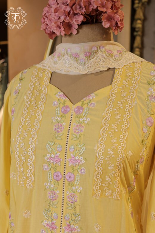 Floral Thread Embroidered Chikankari and Lace Border Suit Set featuring a straight floral embroidered tunic, scalloped cutwork trousers, and sheer dupatta from Kridhaa.