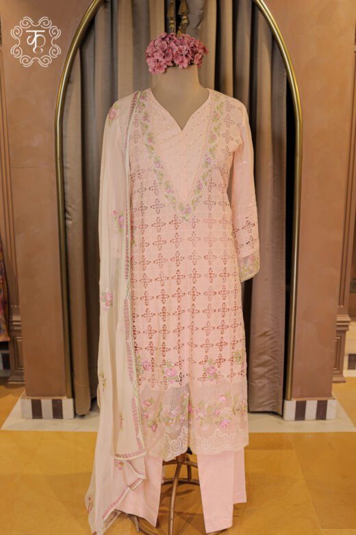 Complete silhouette of the All-Over Schiffli Cutwork and Pearl Embellished V-Neck Suit Set displaying the straight tunic and tailored trousers from Kridhaa.