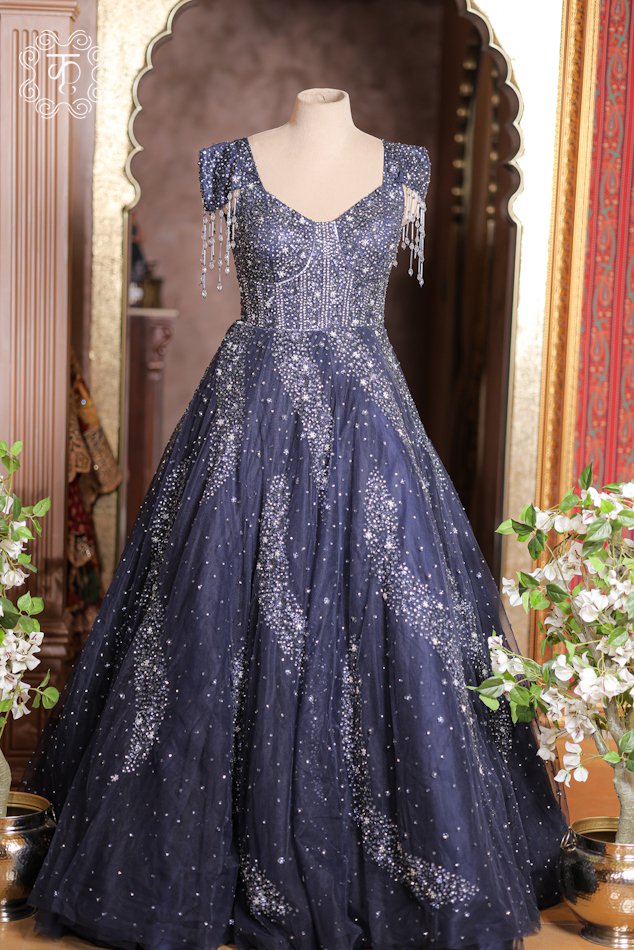 Crystal Sequined Sweetheart Corset Ball Gown featuring a crystal-embroidered corset bodice, dangling bead tassel cap sleeves, and a flared sequined skirt from Kridhaa.