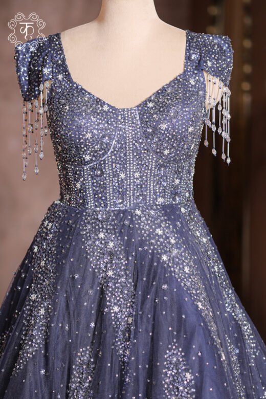 Close-up of the silver crystal gridwork, cutdana, and sequin embroidery on the corset bodice of the Crystal Sequined Sweetheart Corset Ball Gown.