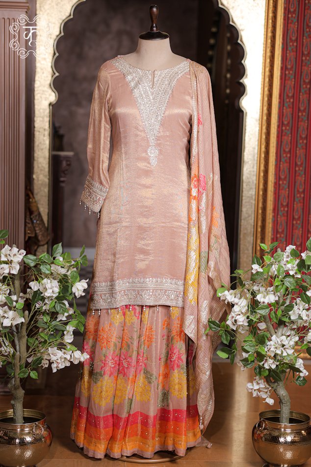 Close-up of the zardozi threadwork and sequin embellishments on the neckline yoke of the Embellished Zardozi Neck Tissue Silk Kurta Set.