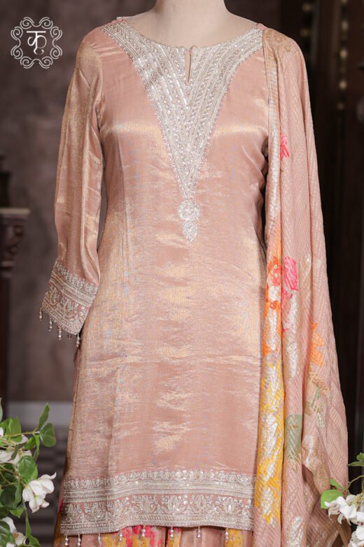 Close-up of the embroidered hem and hanging pearl tassels on the Embellished Zardozi Neck Tissue Silk Kurta Set tunic.