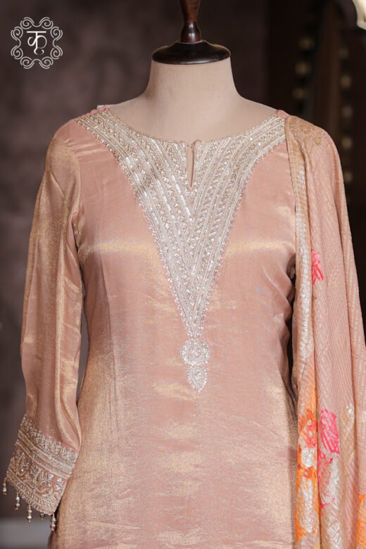 Complete silhouette of the Embellished Zardozi Neck Tissue Silk Kurta Set displaying the straight tunic and voluminous sharara from Kridhaa.