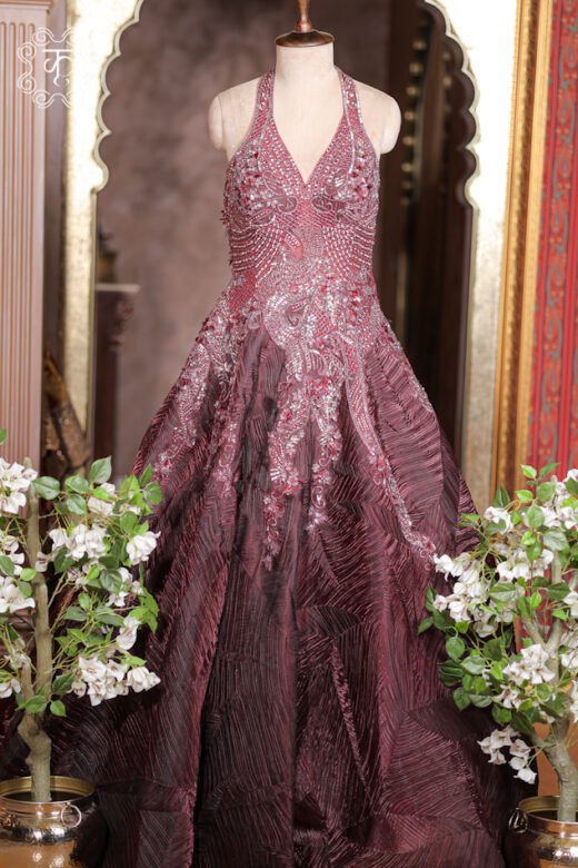 Halter-Neck Heavy Cutdana Embroidered Structured Texture Ball Gown featuring a silver-embroidered bodice and a flared textured skirt from Kridhaa.
