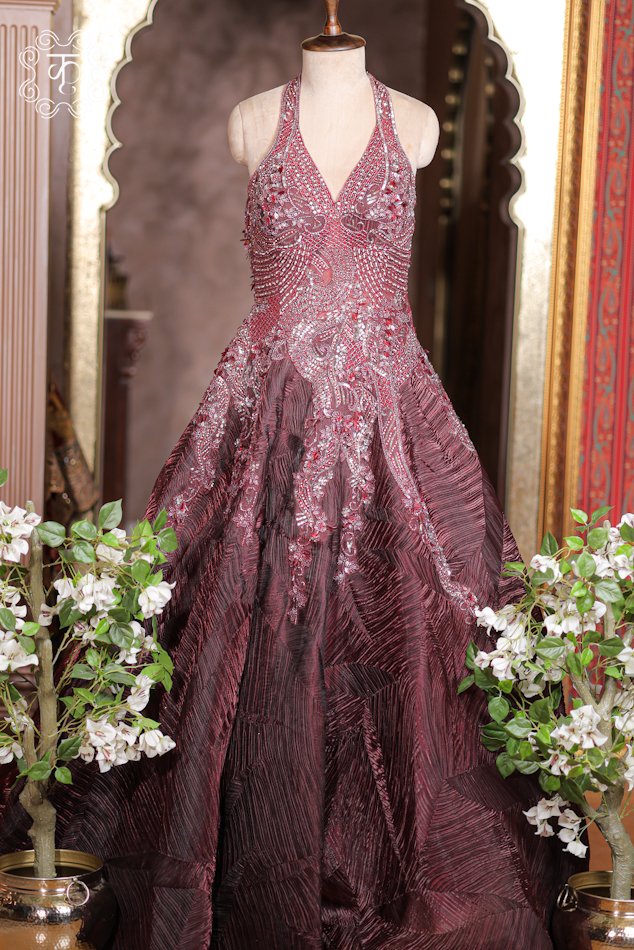 Halter-Neck Heavy Cutdana Embroidered Structured Texture Ball Gown featuring a silver-embroidered bodice and a flared textured skirt from Kridhaa.