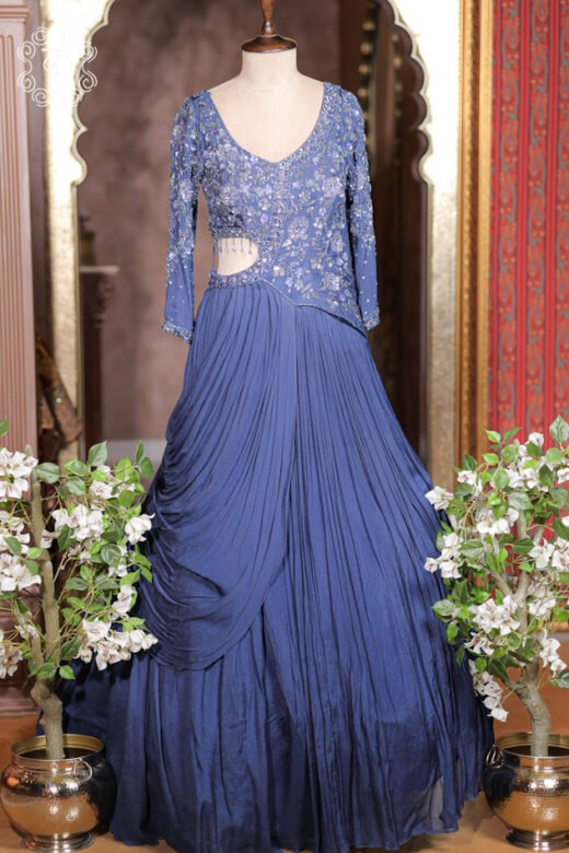 Close-up of the side waist cut-out with dangling crystal fringe drops on the Sequined Cut-Out Waist Hand-Embroidered Pre-Draped Gown.