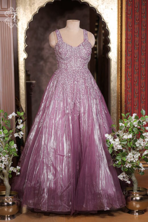 Complete floor-length ball gown silhouette of the Crystal Embroidered Sweetheart Corset Metallic Tissue Ball Gown from Kridhaa.