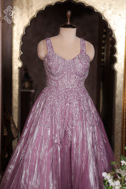 Crystal Embroidered Sweetheart Corset Metallic Tissue Ball Gown featuring a crystal bodice and a shimmering crushed skirt from Kridhaa.