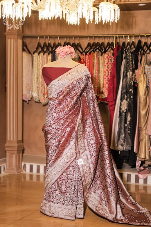 Close-up of the all-over silver and gold floral jaal zari brocade pattern on the Banarasi Katan Silk Floral Jaal Brocade Saree.