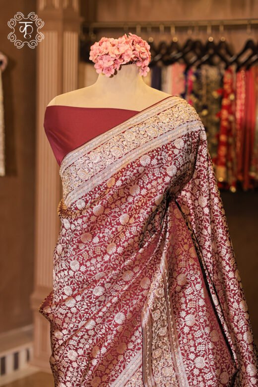 Close-up of the silver zardozi, sequins, and fine embroidery on the border of the Banarasi Katan Silk Floral Jaal Brocade Saree.