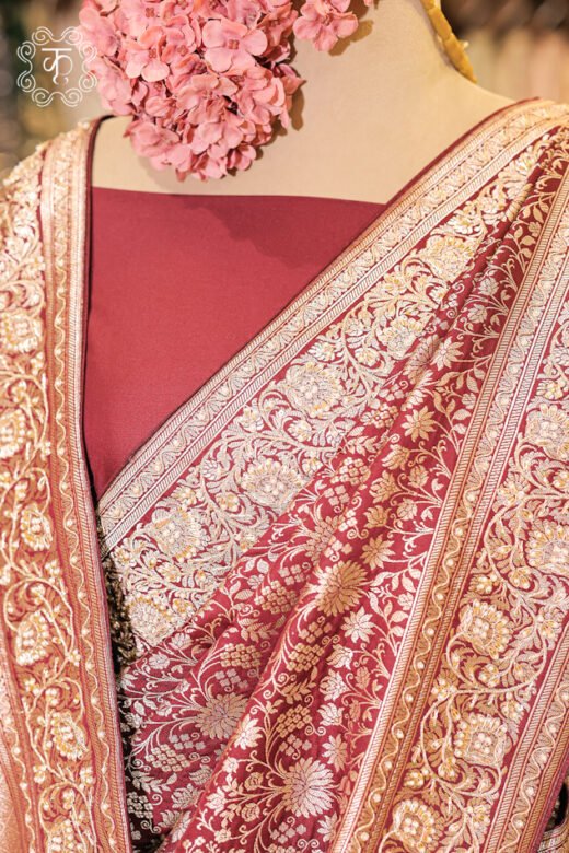 Detailed view of the mughal paisley pallu corners and solid blouse styling on the Banarasi Katan Silk Floral Jaal Brocade Saree.