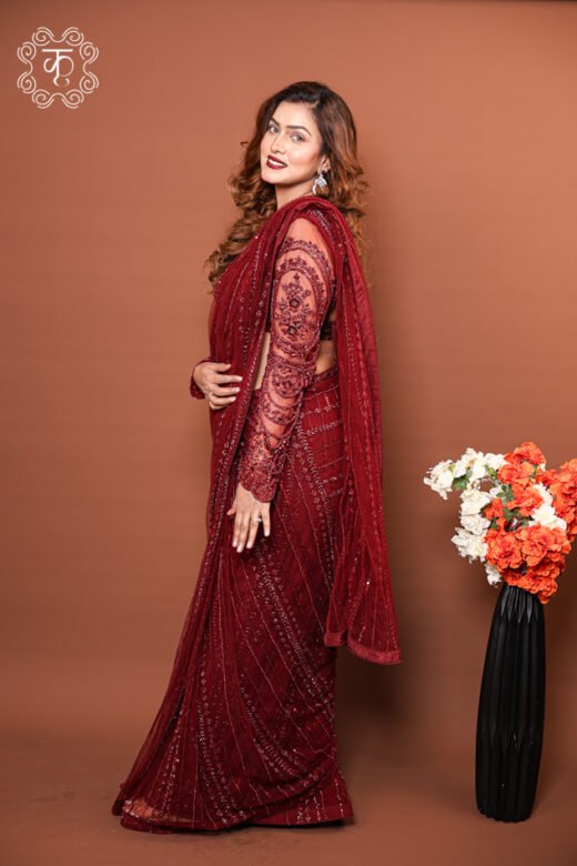 Georgette Concept Pre-Draped Saree featuring diagonal sequin embroidery and an embellished sheer sleeve blouse from Kridhaa.