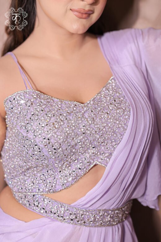 Georgette Ruffle Concept Saree Set featuring a pre-draped ruffle saree, heavily embellished sequin bustier, and waist belt from Kridhaa.