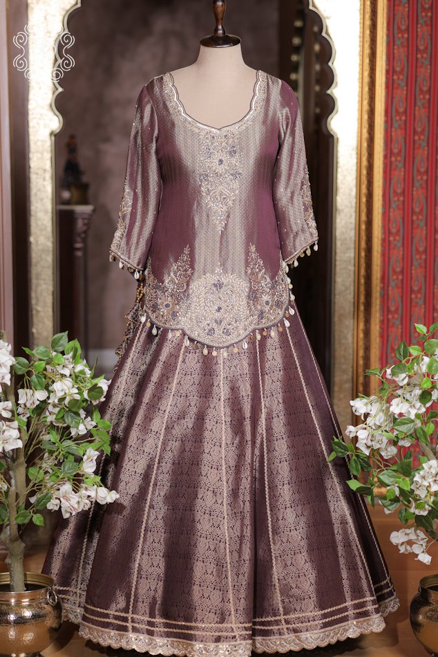 Close-up of the hand-embroidered zardozi neckline, sequins, and side hem shell tassels on the Banarasi Silk Brocade Lehenga Set.