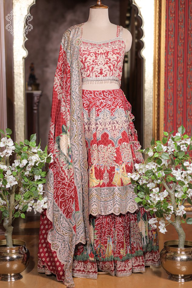Close-up of the square-neck thread embroidery, sequin highlights, and hanging bead tassels on the choli of the Printed Silk Lehenga Set.