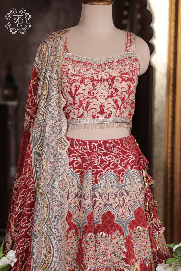 Printed Silk Lehenga Set featuring Pichwai artwork prints, an embroidered square-neck choli, fringed bead hem, and matching dupatta from Kridhaa.