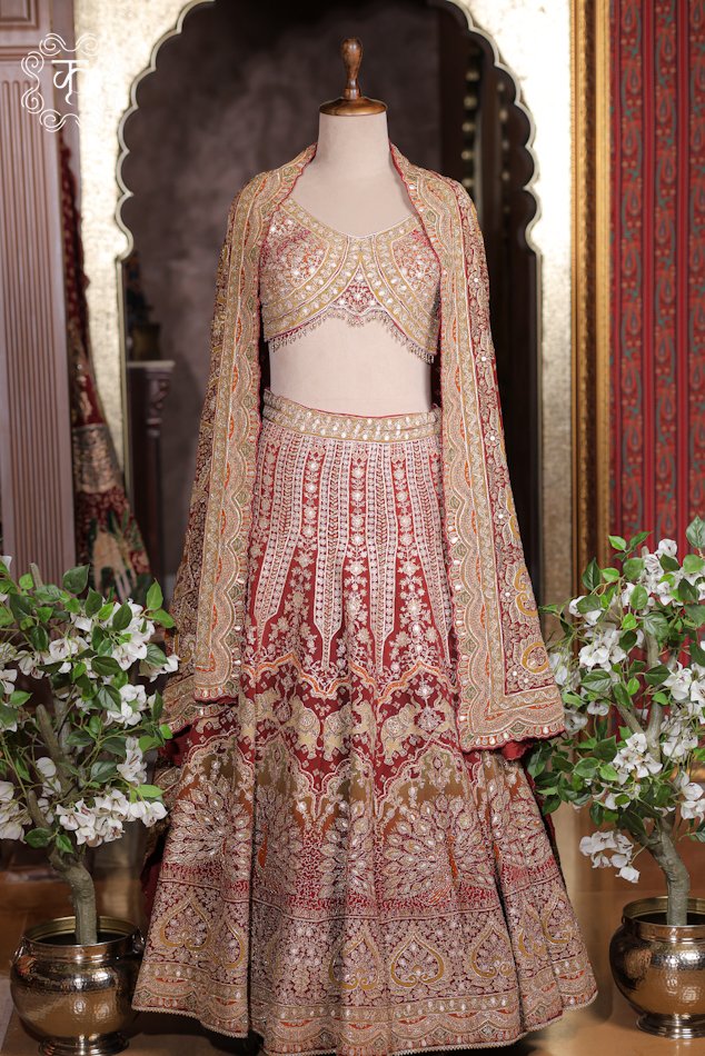 Embroidered Georgette Lehenga Set featuring elephant motif kalis, a scalloped mirror-work corset choli, and embroidered cape dupatta from Kridhaa.