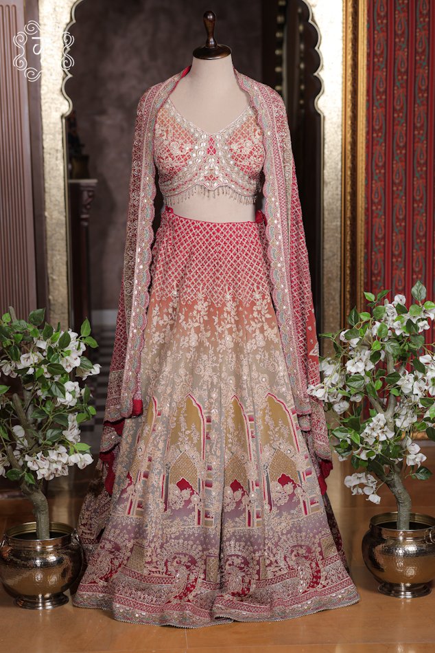 Ombre Georgette Lehenga Set featuring a gradient flared skirt, scalloped mirror-work corset choli, and embroidered cape dupatta from Kridhaa.