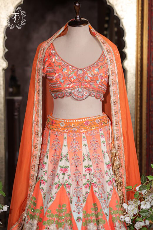 Printed Silk Lehenga Set featuring botanical peacock prints, a scalloped embroidered choli, and a cape dupatta drape from Kridhaa.
