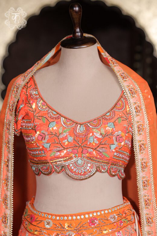 Close-up of the botanical floral panels, peacock motifs, and heavy tassel latkans on the Printed Silk Lehenga Set skirt.